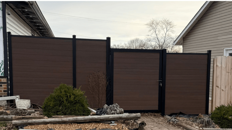 Brown composite fencing with wood-look privacy fence panels from StackFence