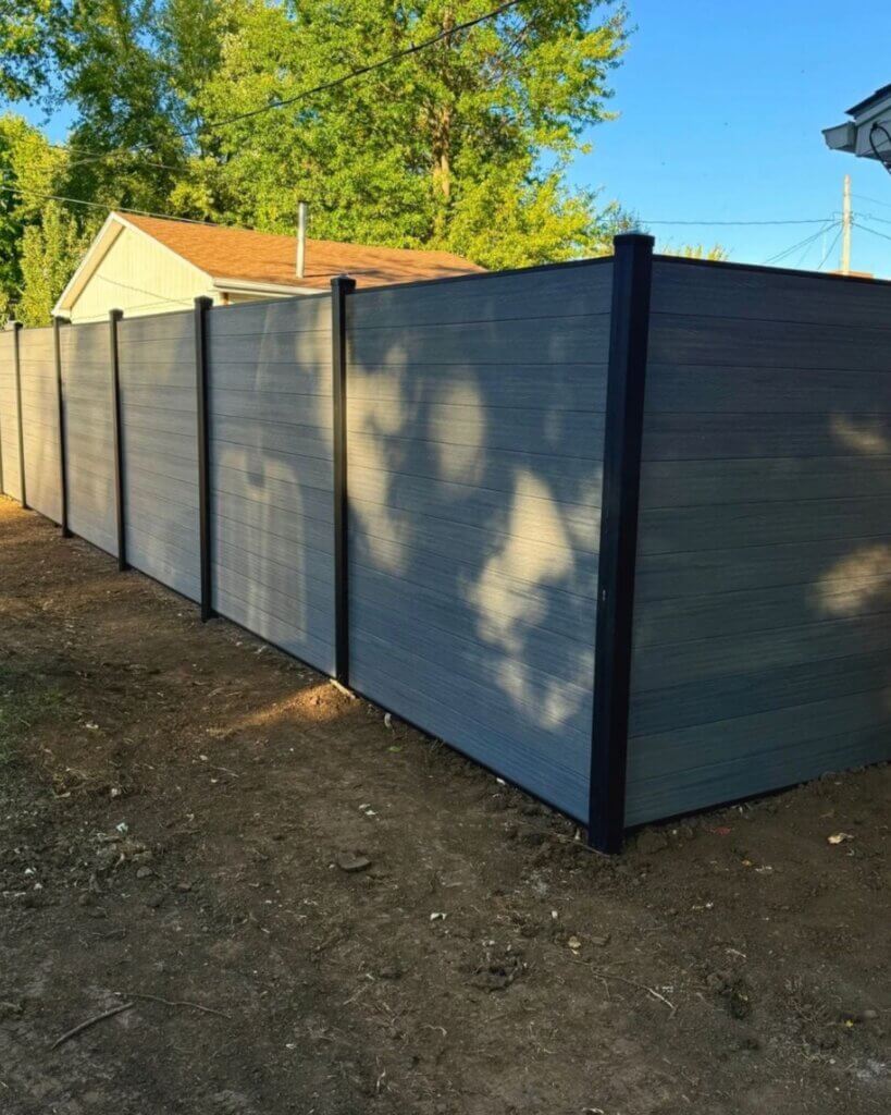 Storm Grey Composite Fence installed In Sedalia